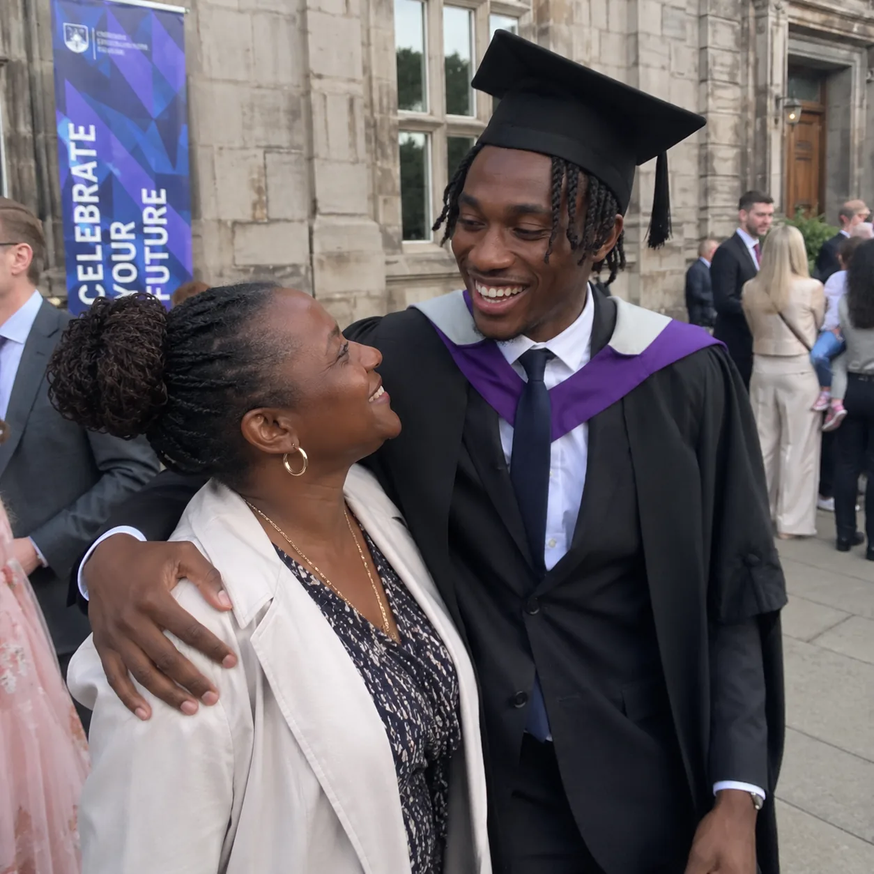 Graduates celebrating together after their ceremony